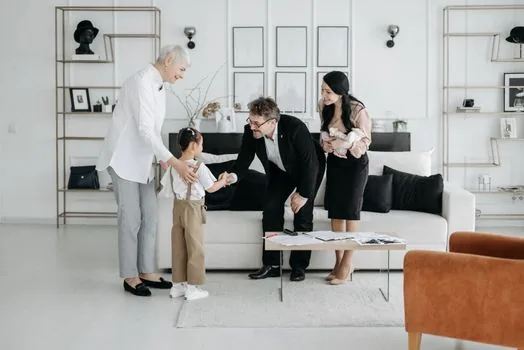 adult child calling community service center while checking elderly parent's bankbook and disability allowance application memo, calm realistic home photo | 주민센터에 첫 지급 월을 확인하는 장면