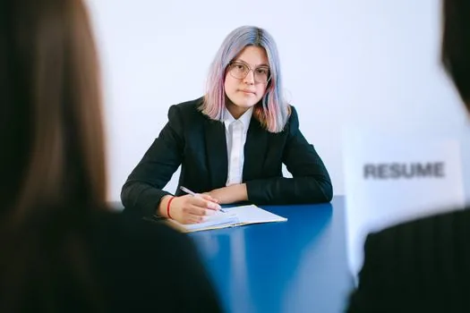 Korean senior job seeker checking resume and employment consultation appointment with adult child at public job center desk