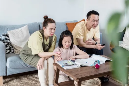 Korean adult child checking elderly parent's basic pension certificate and welfare checklist at home table, realistic warm photo | 부모님 자격과 돌봄 필요 상황을 신청 전 정리하는 장면
